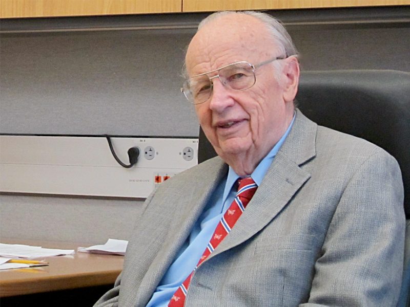 Ivo Babuska sitting at desk in his office.