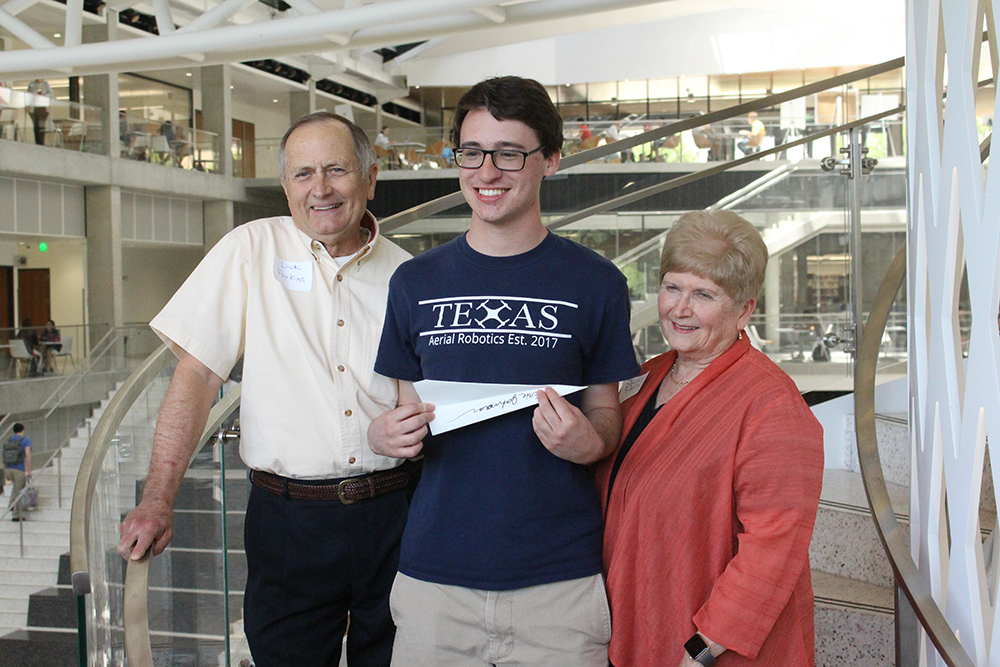 Dick and Judy Perkins with student photo
