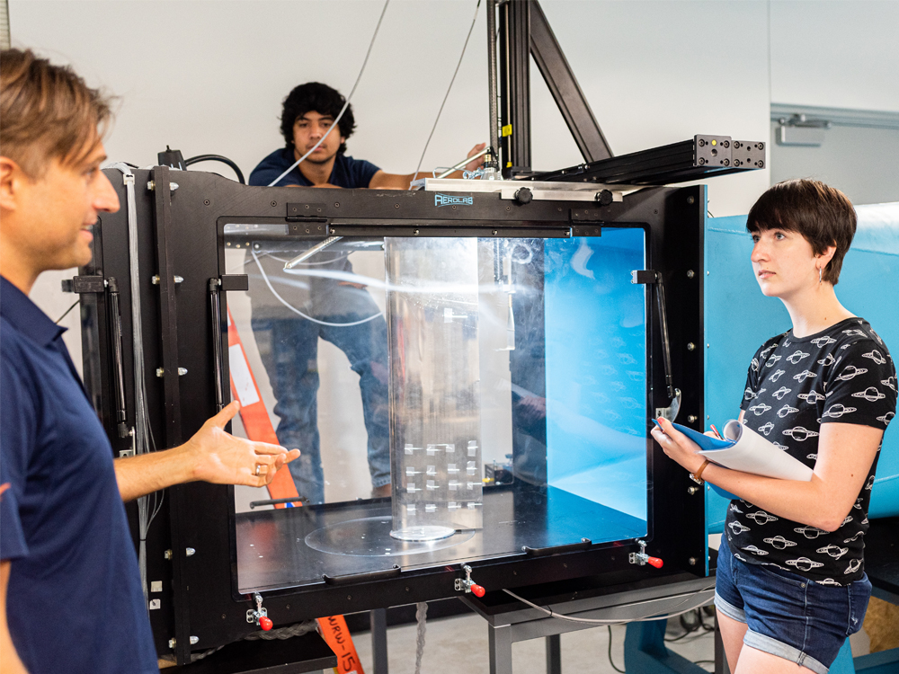 students work in the low speed wind tunnel lab