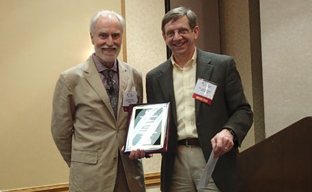 Ken Liechti receiving Adhesion Award