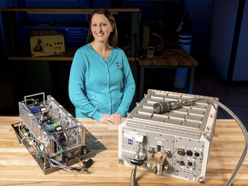 photo of Kristen John with research project