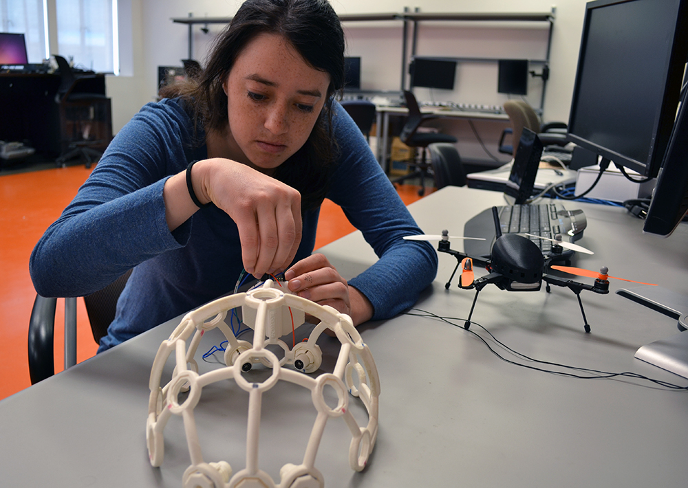 student with UAV helmet