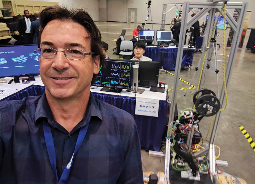 Luis Sentis with robot