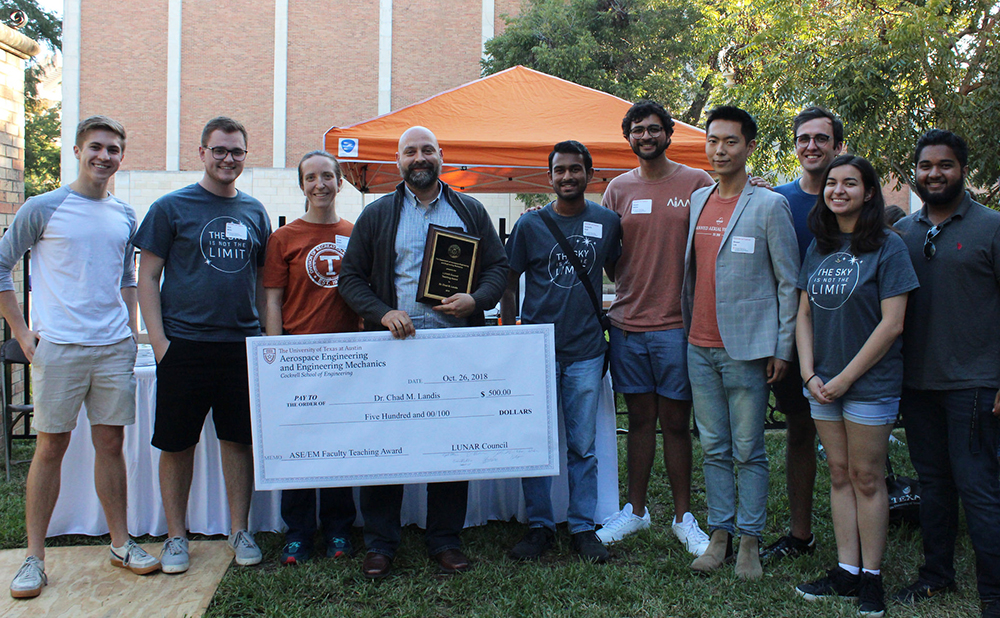 Chad Landis photo with students
