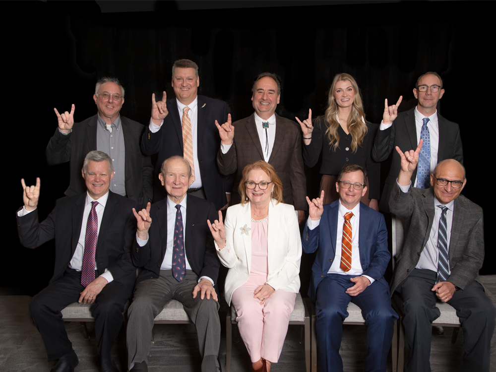 Academy of Distinguished Alumni inductees smiling together