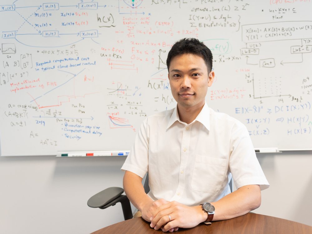 photo of takashi tanaka at whiteboard