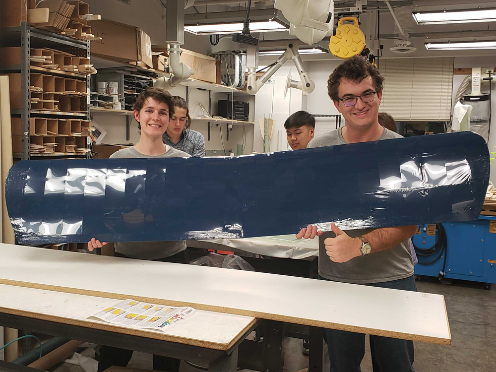 just winging it team working in lab