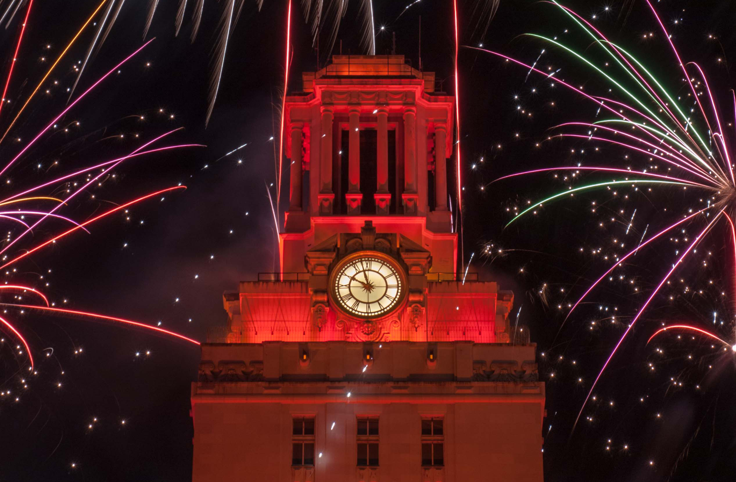 photo of UT Tower with fireworks