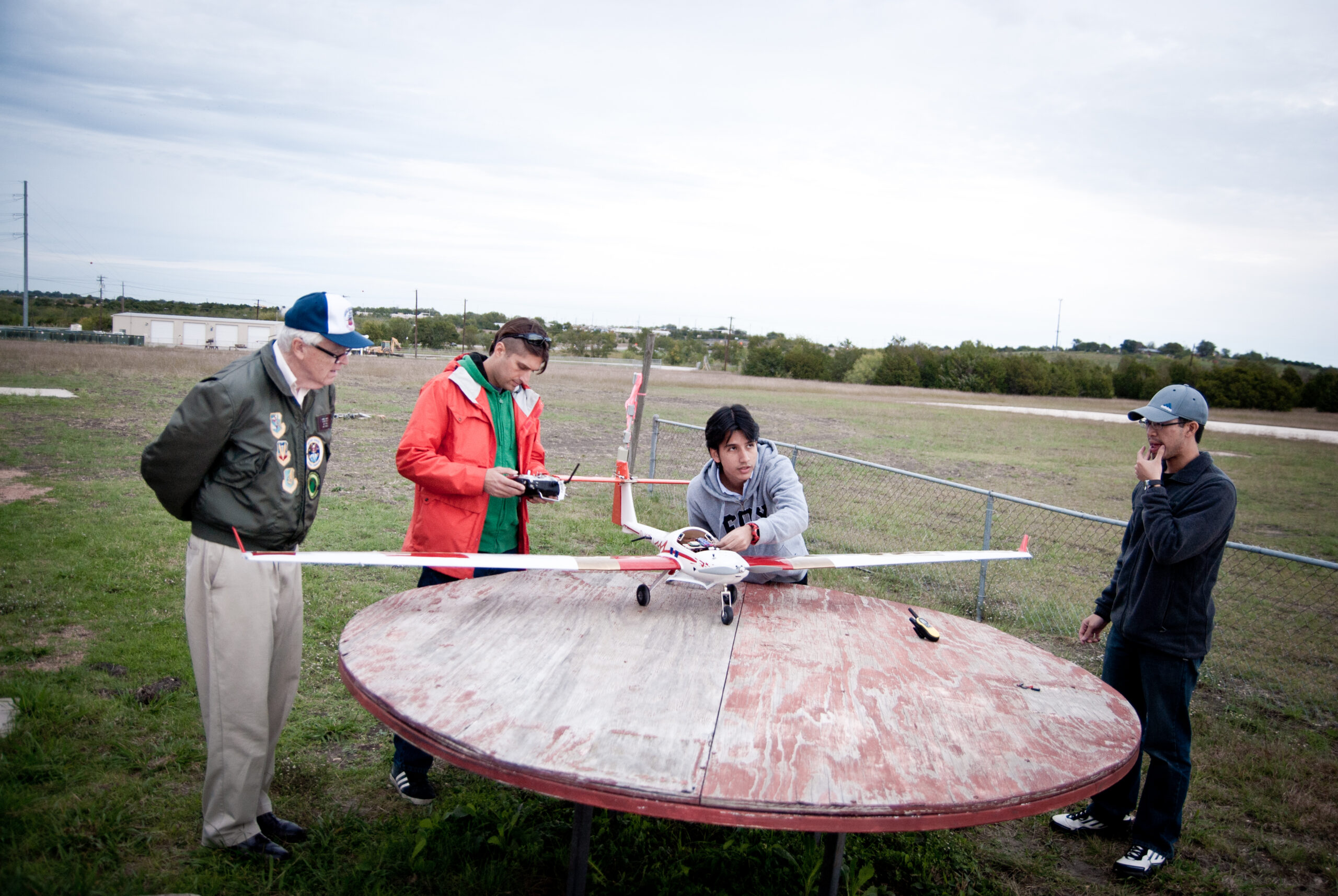 Hans Mark with students at senior aircraft design flyoff