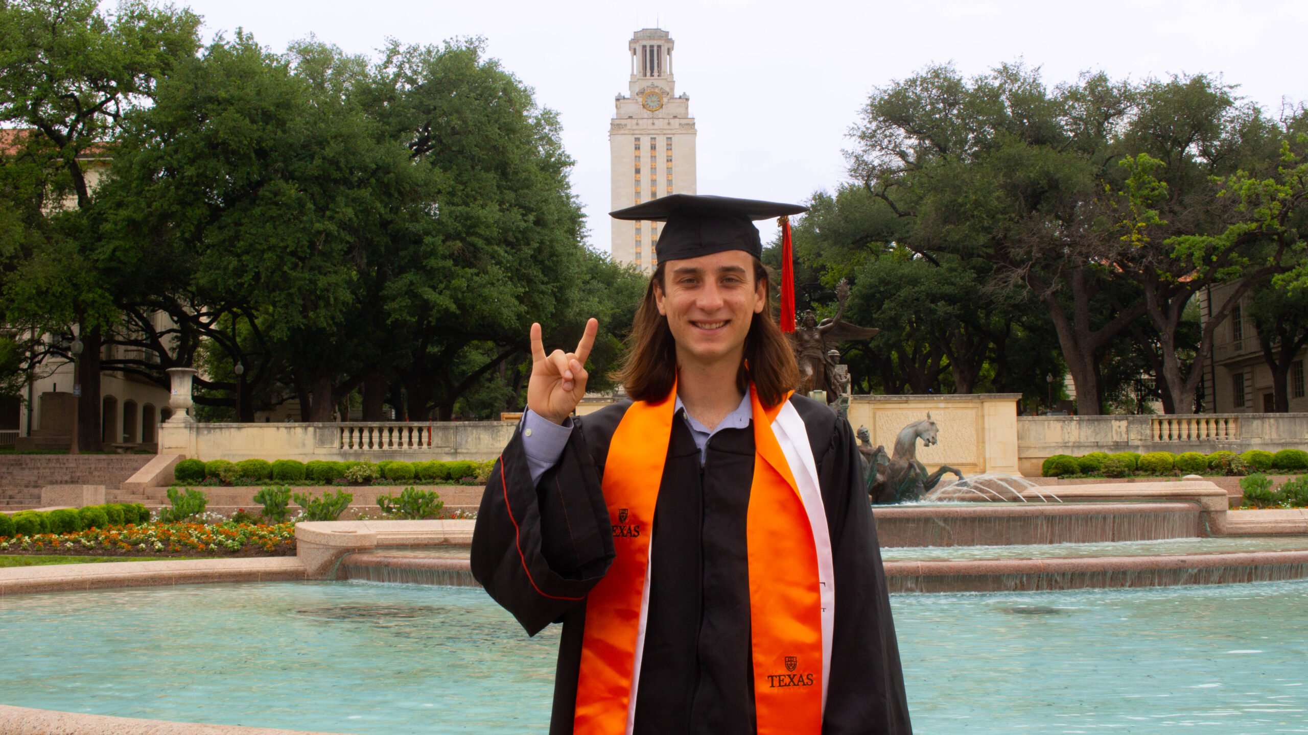 photo of nicholas aufiero in front of ut tower
