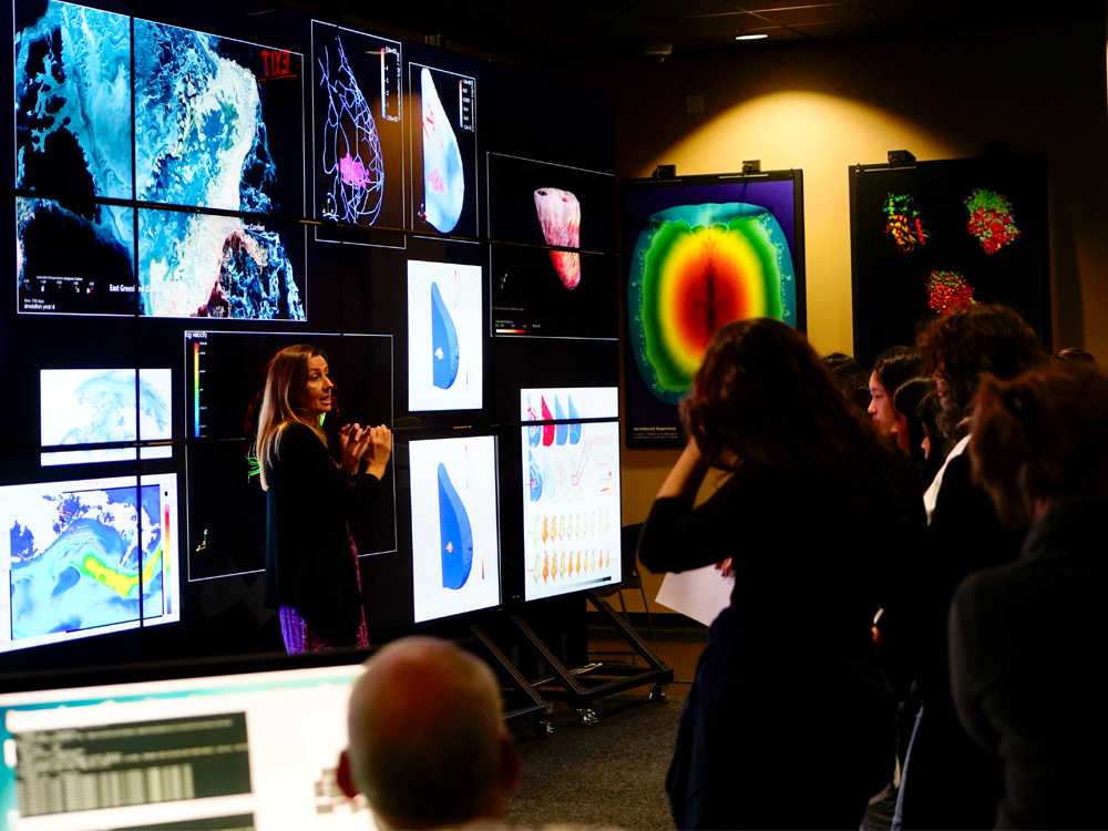 Karen Willcox with high school students in Texas Advanced Computing Center Vis Lab
