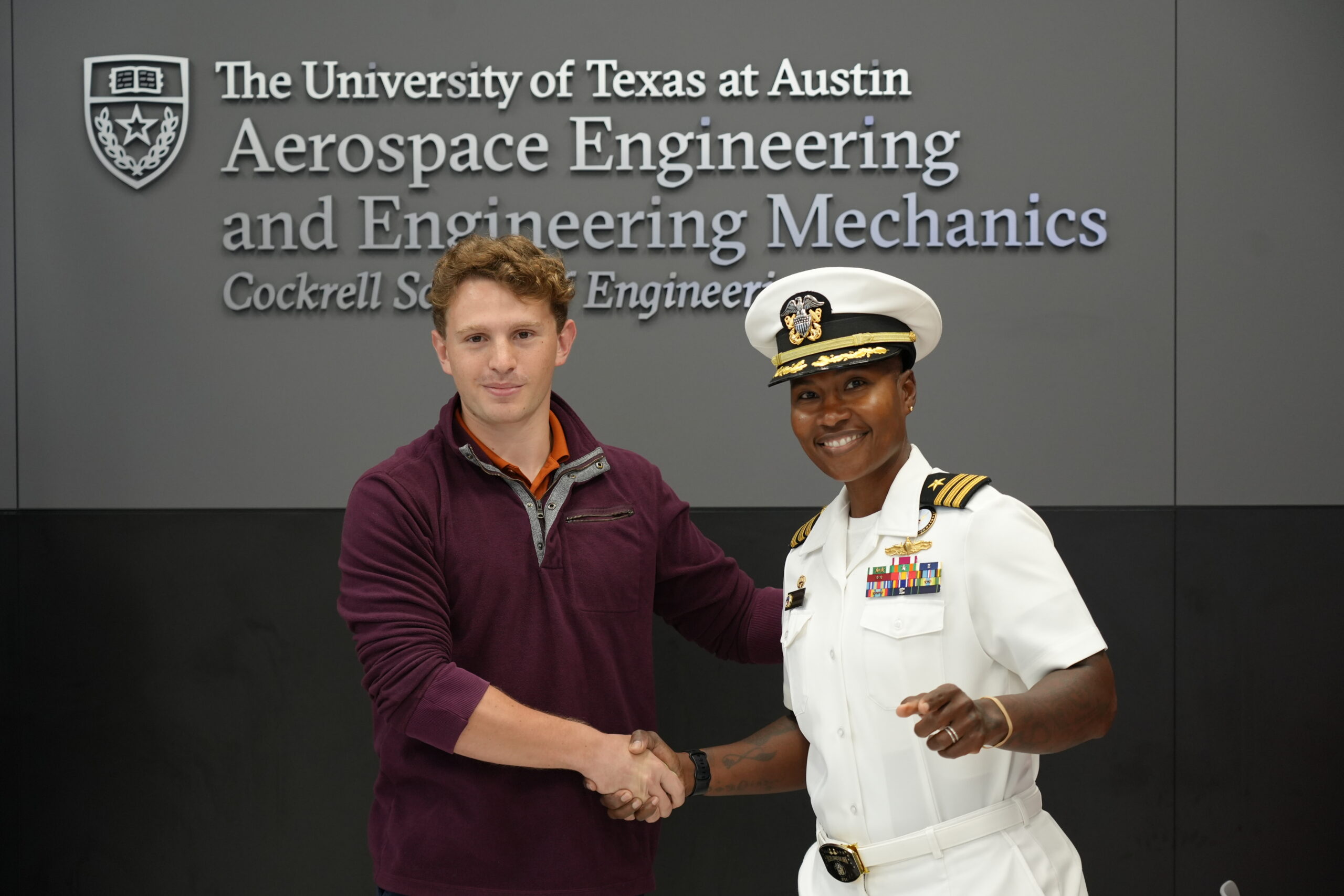 photo of Robert Ross-Kirov with U.S. Navy Cmdr. Stacey O’Neil