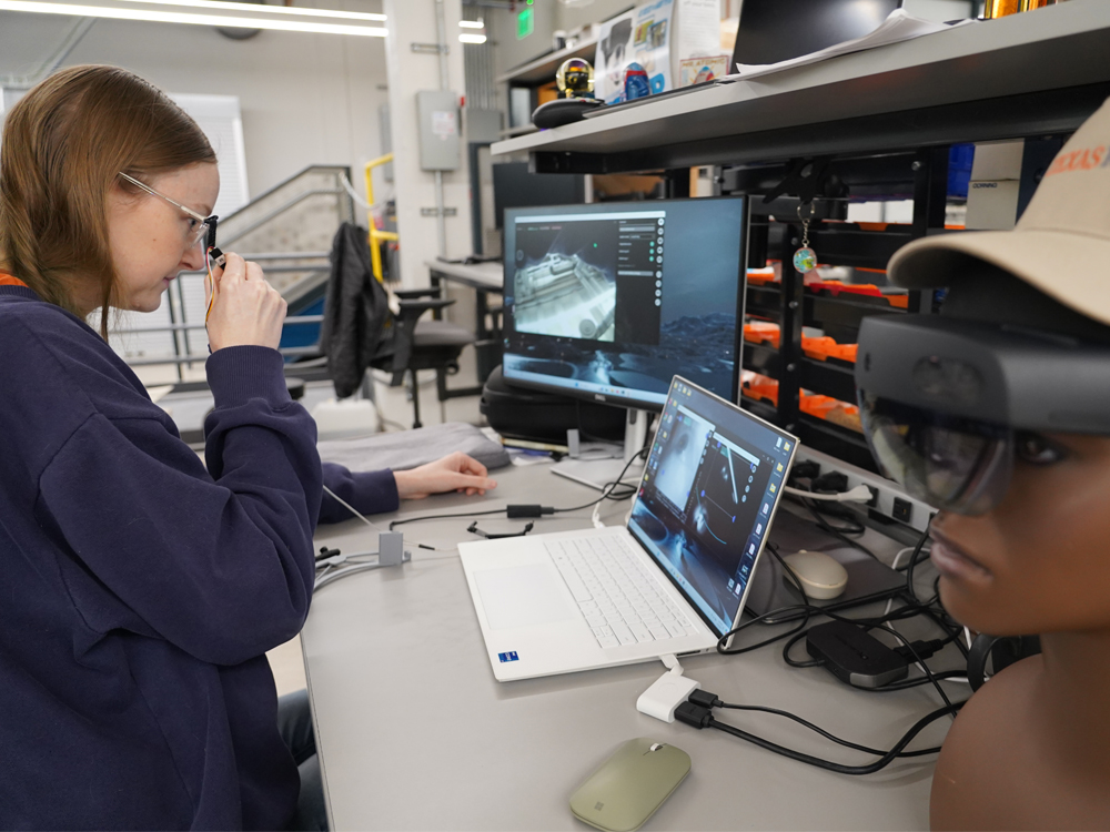 graduate student working in robotics lab