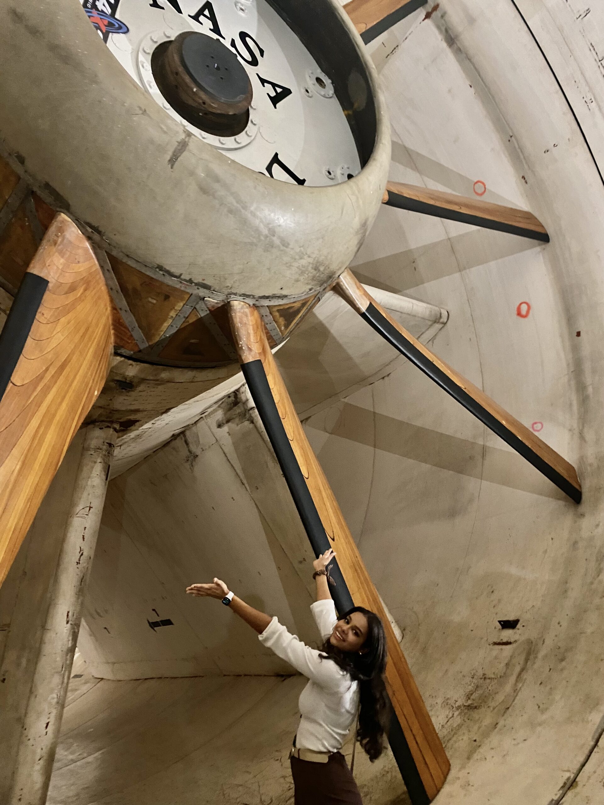 Heavyn Porter gesturing upwards at aircraft part