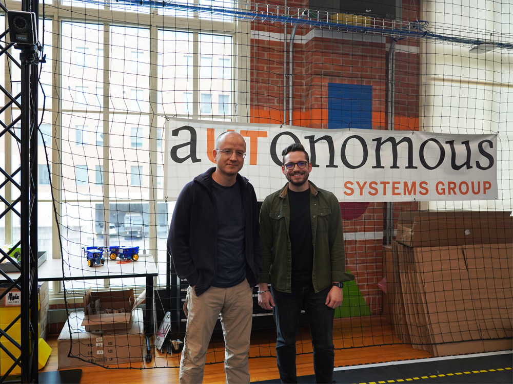 Ufuk Topcu and researcher in UT Autonomy Lab