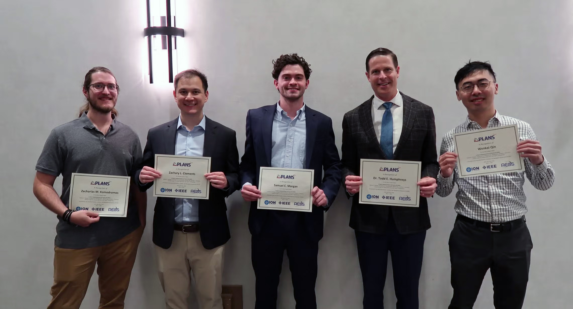 Sam Morgan and Todd Humphreys with IEEE/ION awards group photo