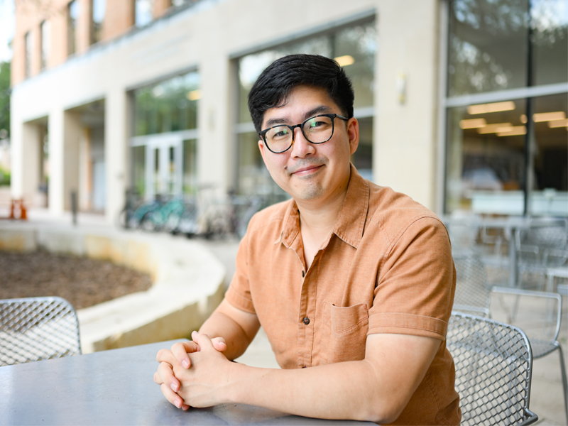 Jesse Chan in front of ASE Building