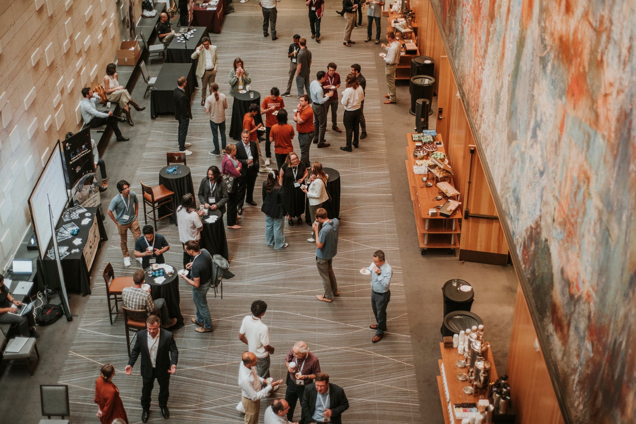 Aerial view of symposium attendees mingling