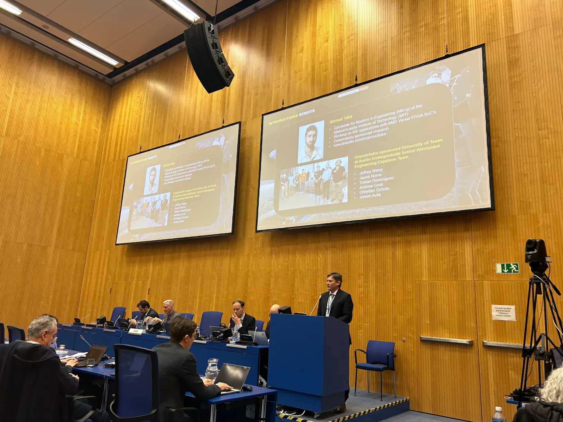 Cesium capstone project being presented at UN. Man at podium talking with presentation behind him.