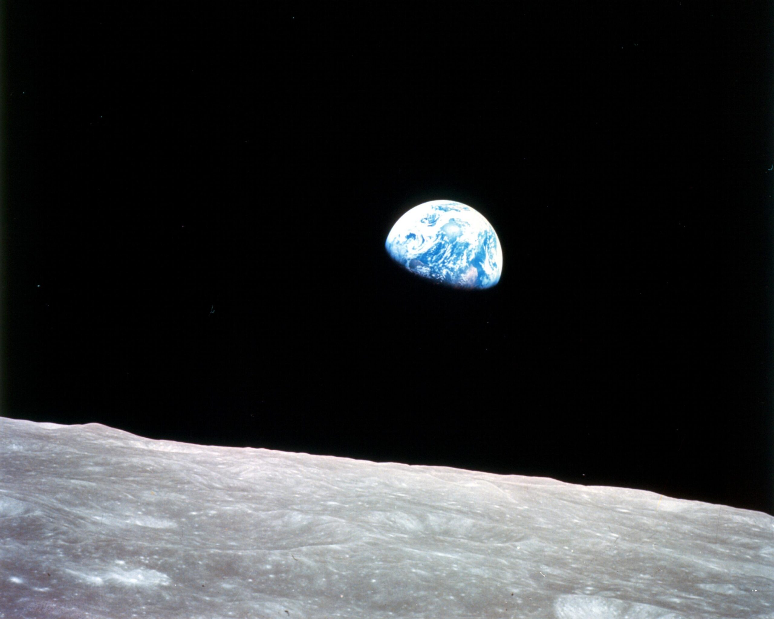 View of Earth from the surface of the moon in space.