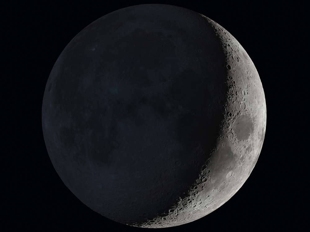 Moon in waxing crescent phase in space